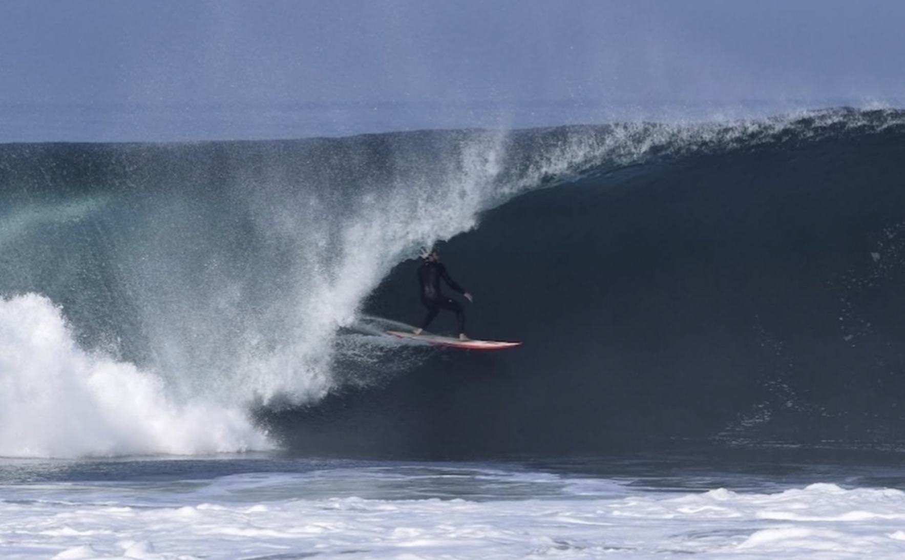 Joey Crum surfing